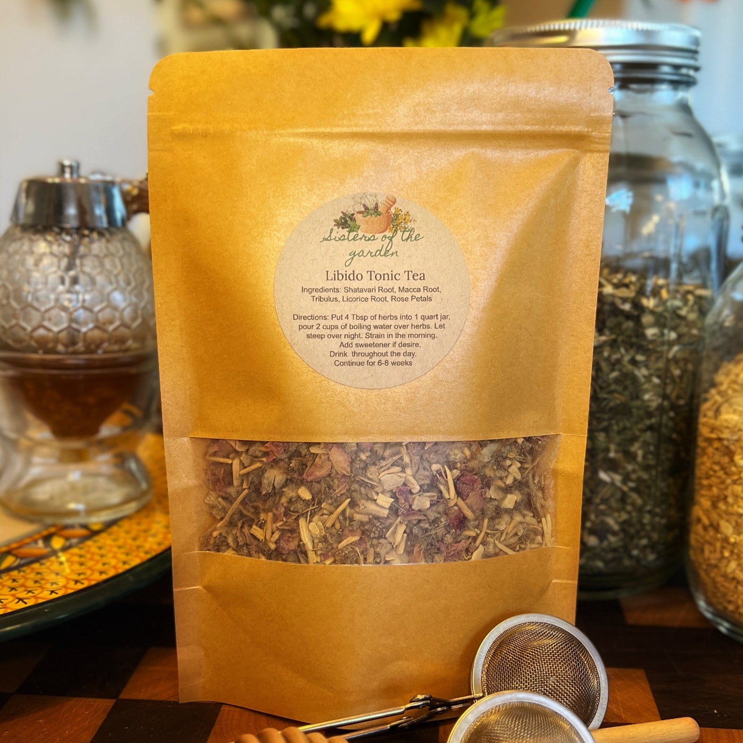 Herbal libido tea blend with ingredients like Tribulus, Eleuthero, Nettle Root, Rhodiola, Ashwagandha, and Cinnamon, known for boosting libido and vitality in men and women.